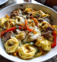 cheesesteak tortellini in rich provolone sauce