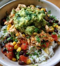 chicken burrito bowl with guac lime