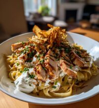 hot honey balsamic chicken alfredo with whipped feta crispy brussels chips