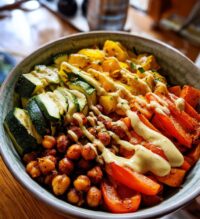 roasted veggie chickpea bowls with maple dijon tahini dressing