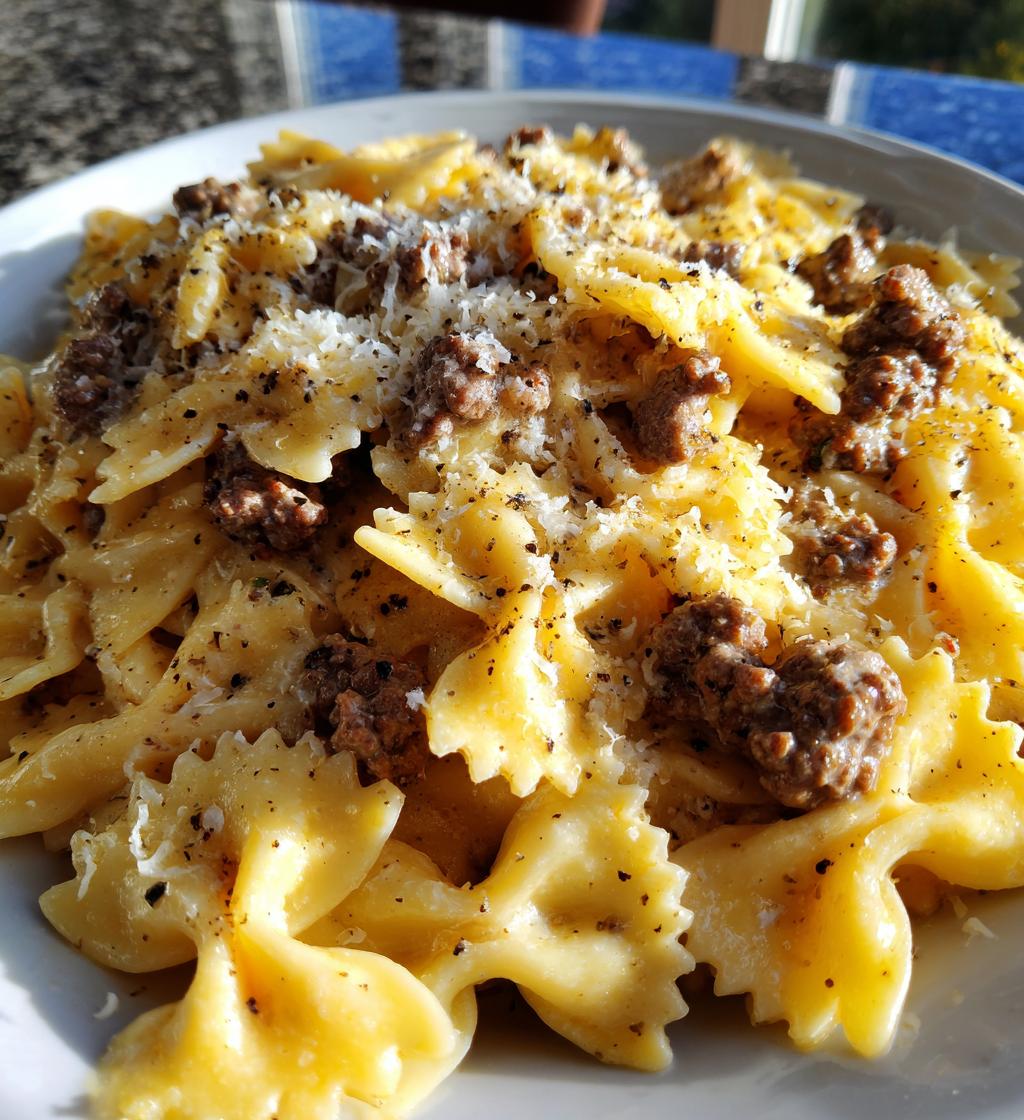 beef and bowtie pasta with alfredo sauce - detail 1