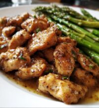 garlic butter chicken bites and asparagus