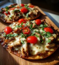 tuscan garlic chicken pita pizzas